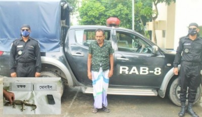 মাদারীপুরে তক্ককসহ আটক এক মাদারীপুরে তক্ককসহ আটক এক